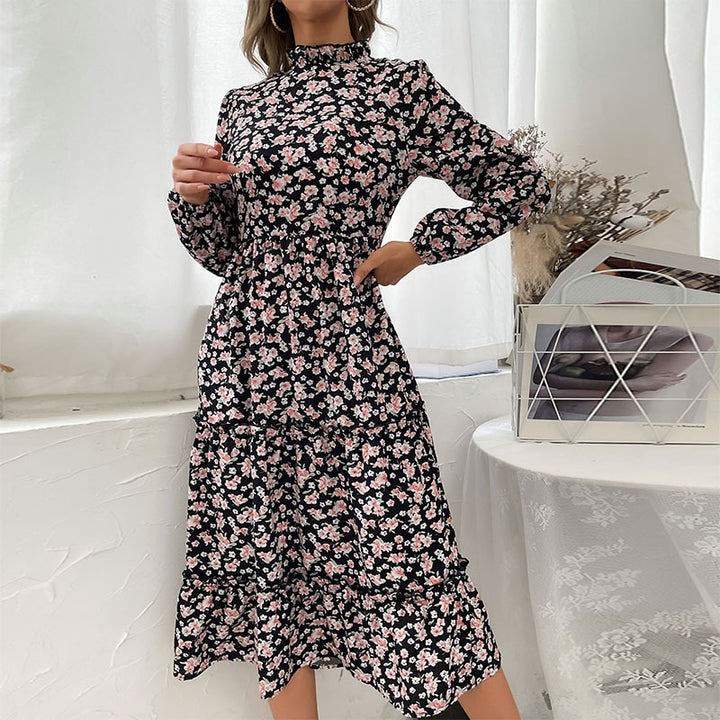 Damen Elegantes Langarm Kleid mit floralem Muster und Rüschendetails Echo Archiv