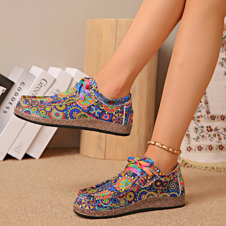 Damen Bequeme Plateau-Slipper im Ethno‑Print mit Korkoptik‑Sohle Echo Archiv