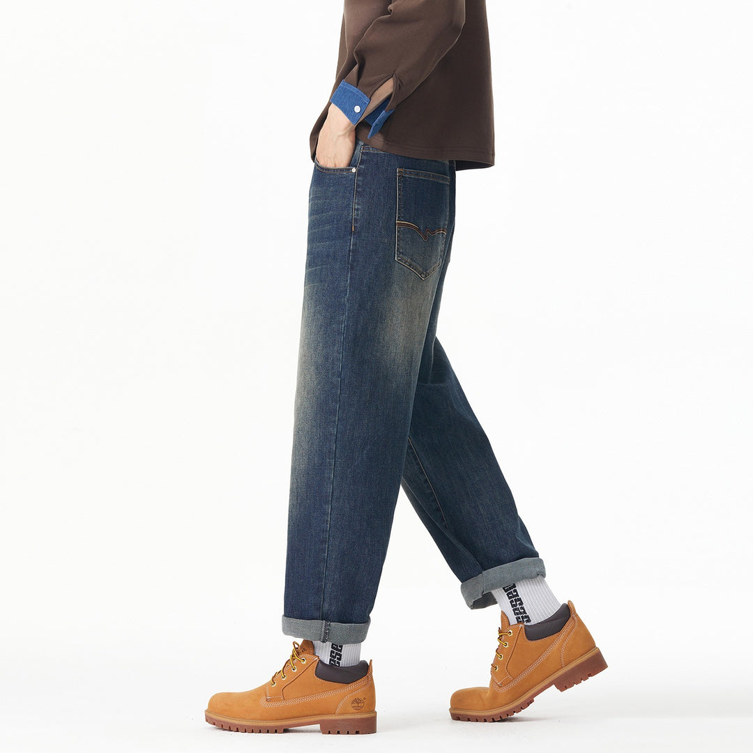 Herren Weite gerade geschnittene Denim-Jeans mit Used‑Wash und Umschlagbund Echoarchiv