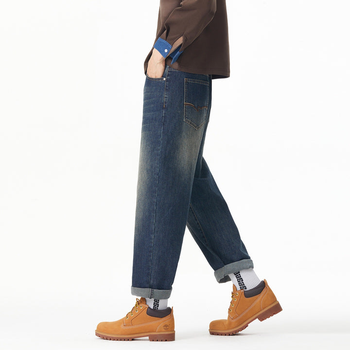 Herren Weite gerade geschnittene Denim-Jeans mit Used‑Wash und Umschlagbund Echoarchiv