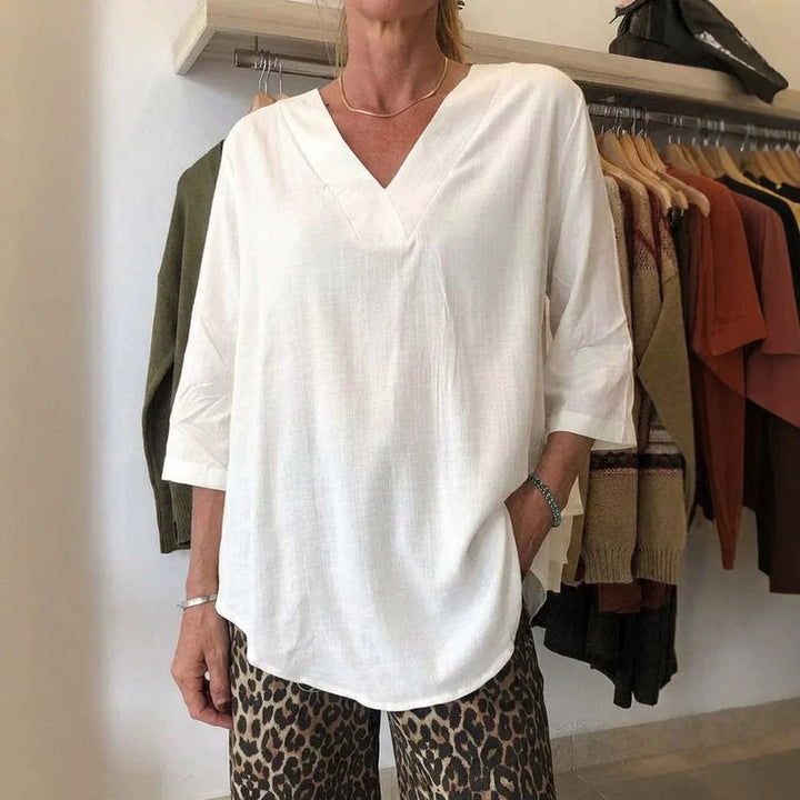 Damen Leichte Oversize V-Ausschnitt Tunika in Leinenoptik mit dreiviertel Ärmeln und abgerundetem Saum – Avérine