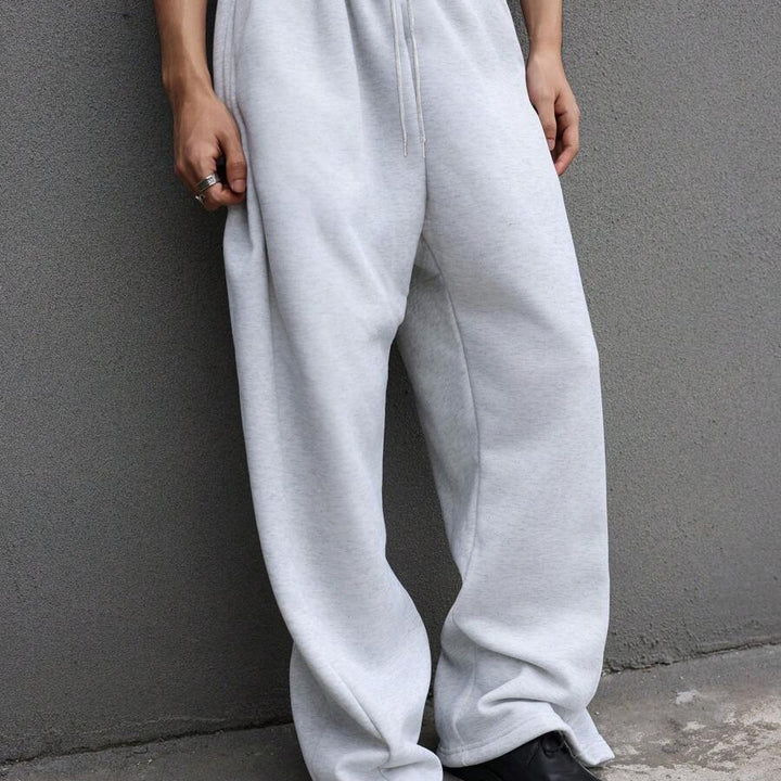 Herren Weite Baggy-Jogginghose mit elastischem Bund, Tunnelzug & extra langem Bein Echoarchiv