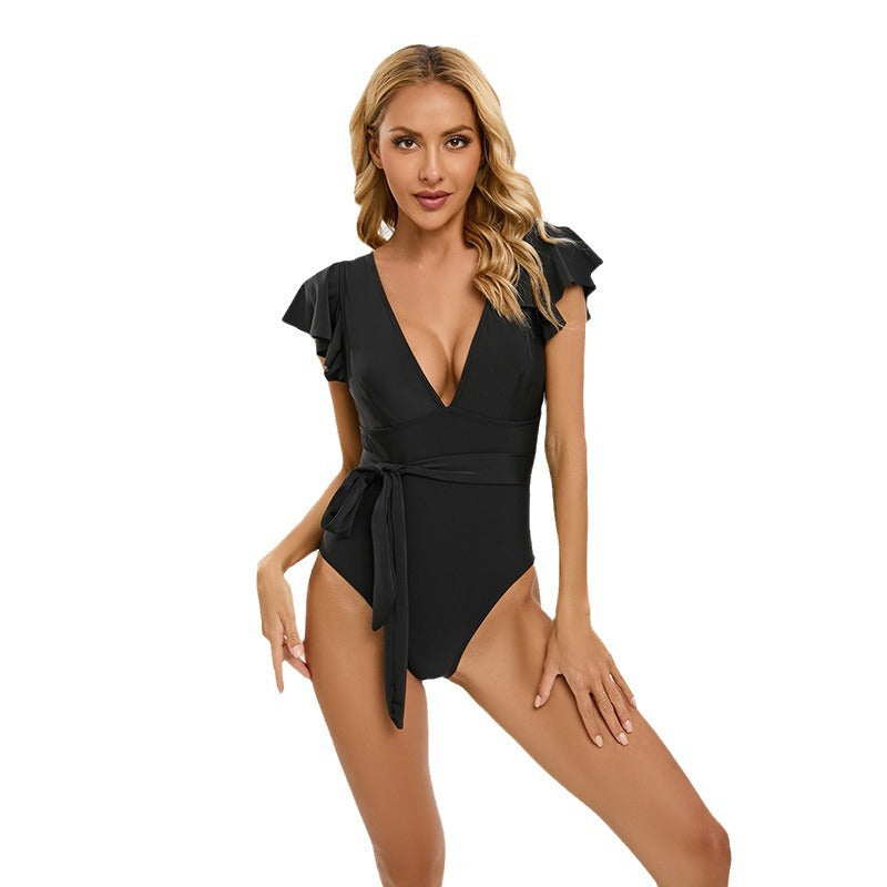 Damen Eleganter Einteiler Badeanzug mit Rüschen und Taillengebung Echo Archiv
