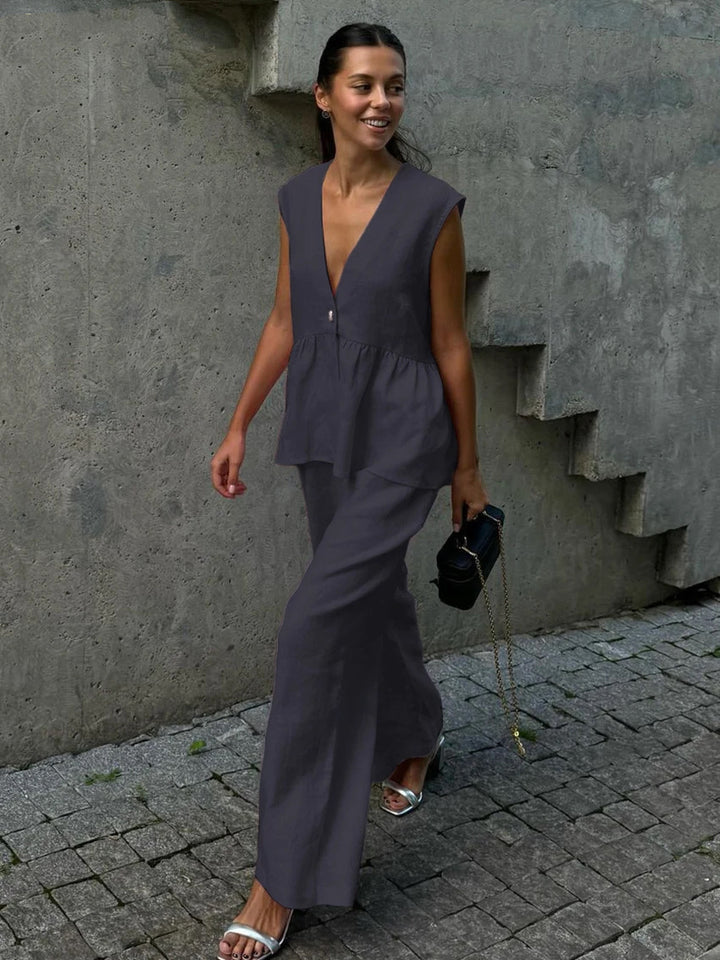 Damen luftiger Jumpsuit mit V-Ausschnitt und fließendem Schnitt Echo Archiv