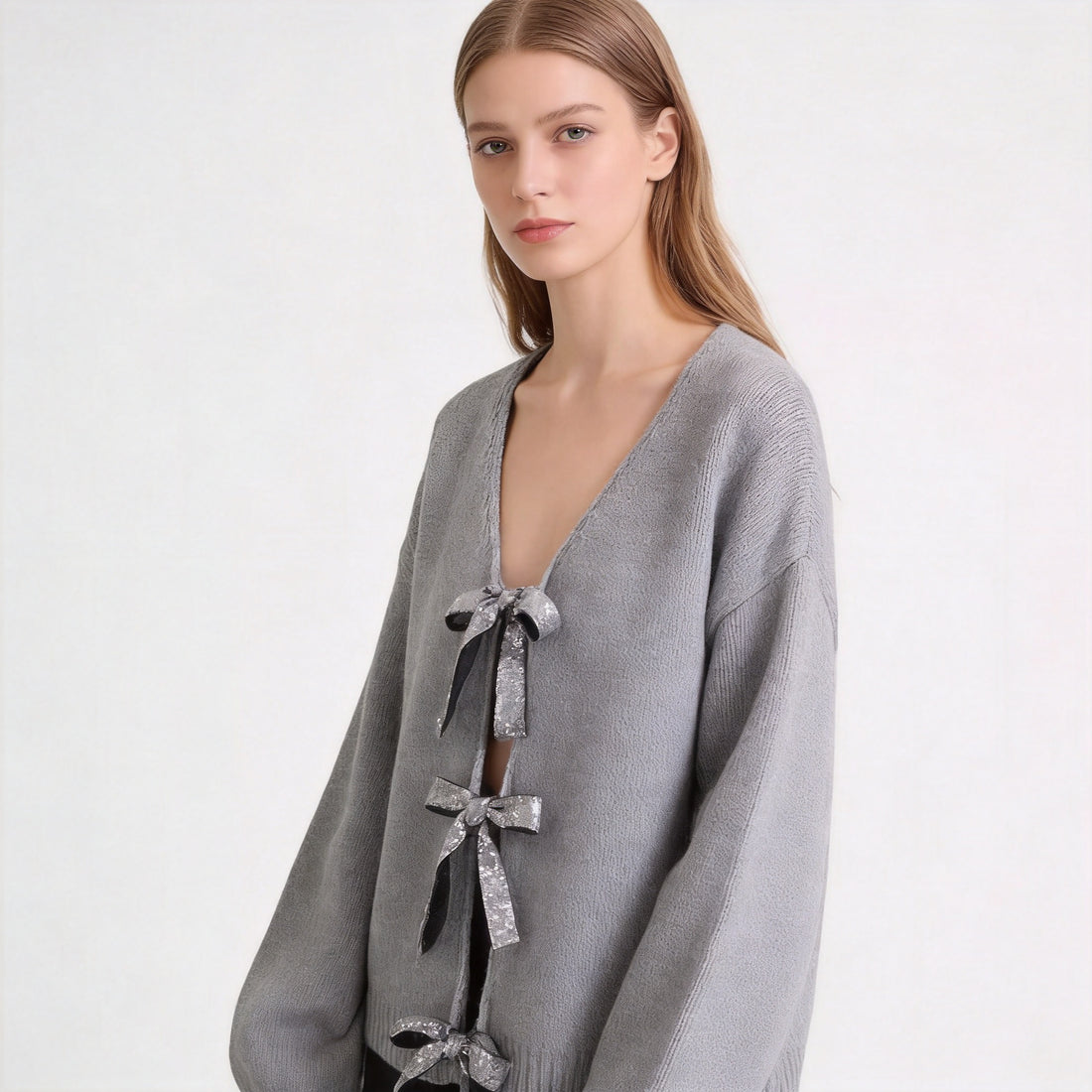 Damen Oversize Strickcardigan mit tiefem V‑Ausschnitt und dekorativen Schleifen Echo Archiv