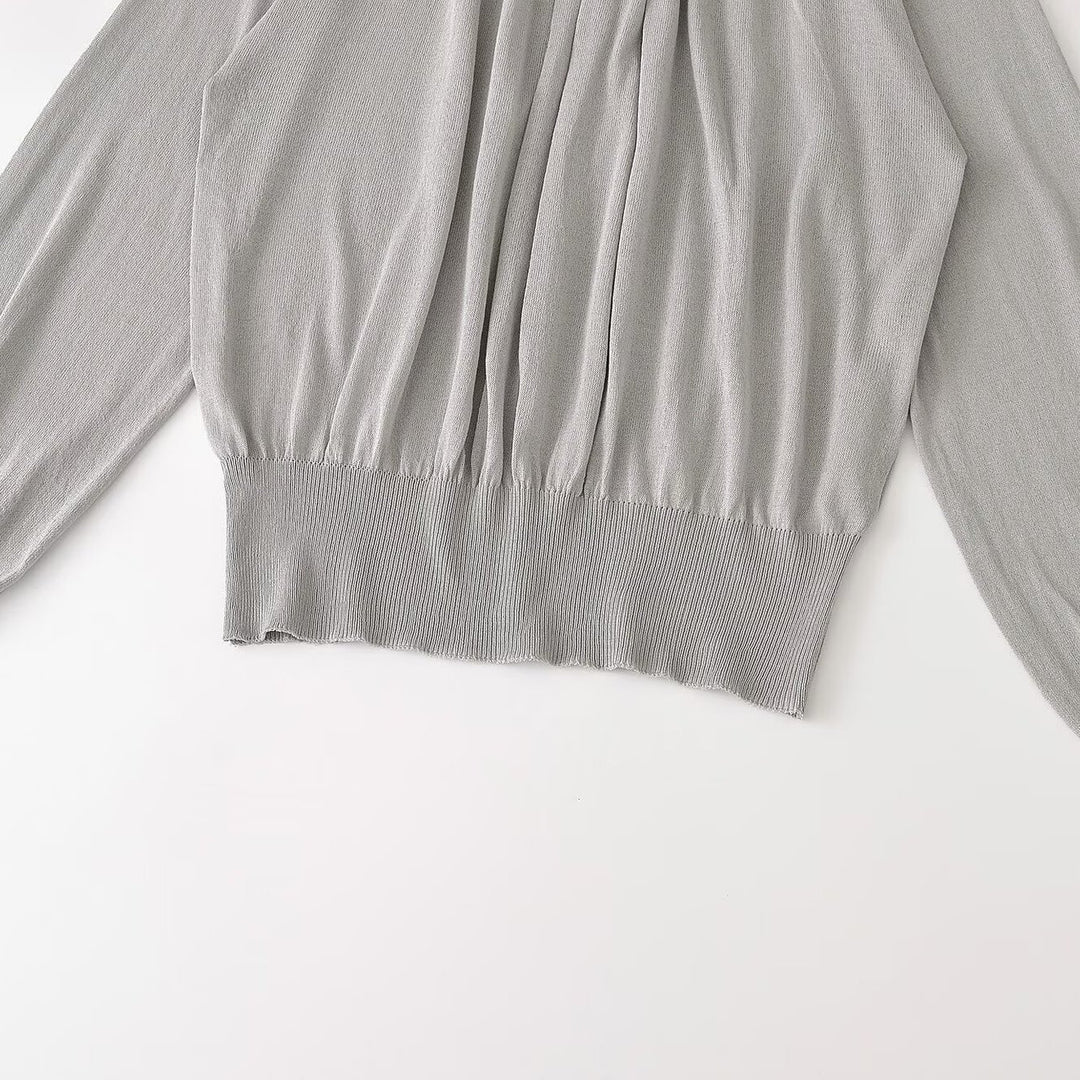 Damen Ballonärmel-Feinstrickpullover mit gerafftem Stehkragen und Knopfdetail Echoarchiv