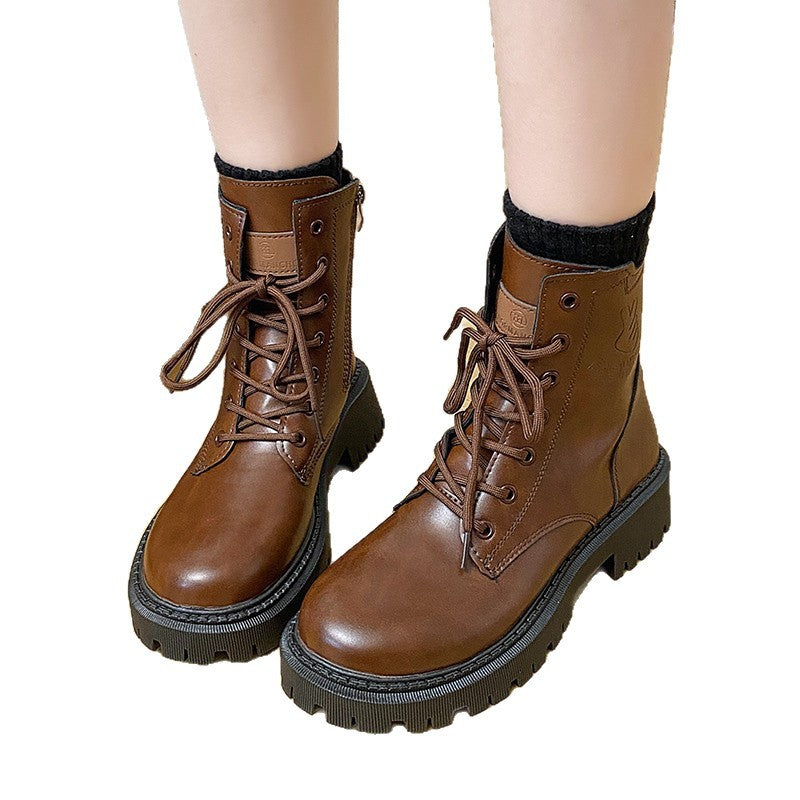 Damen nan knöchelhohe Combat-Boots in Lackoptik mit robuster Profilsohle und seitlichem Reißverschluss Echo Archiv