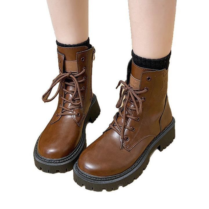 Damen nan knöchelhohe Combat-Boots in Lackoptik mit robuster Profilsohle und seitlichem Reißverschluss Echo Archiv