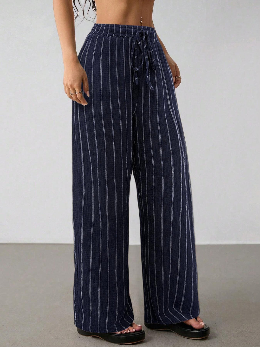 Damen Weite Strickhose mit hohem Bund und Kordelzug Echo Archiv