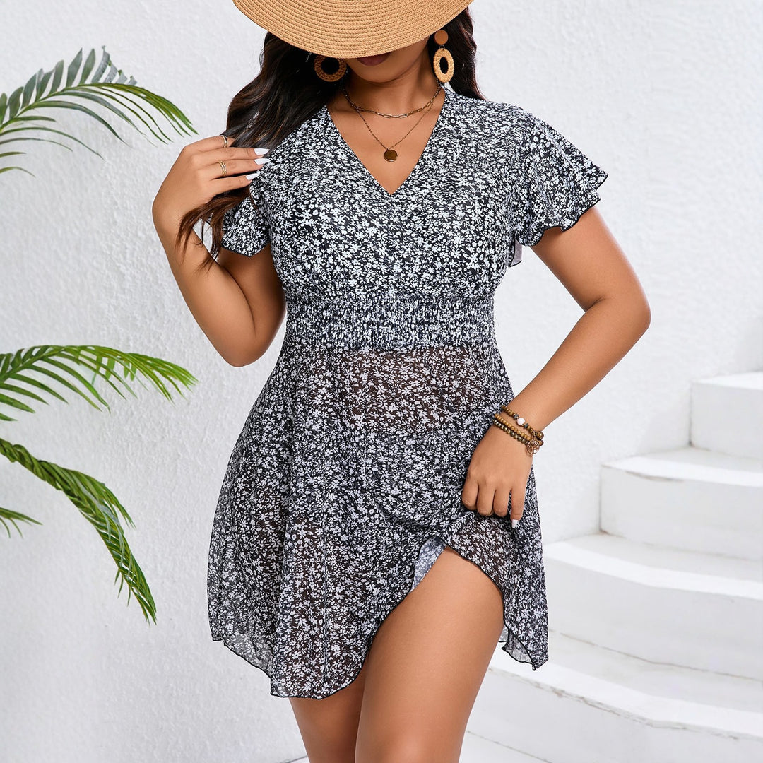 Damen Strandkleid mit floralem Design und Raffung Echo Archiv
