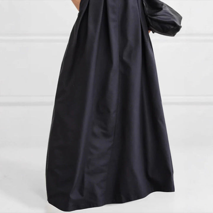 Damen Maxirock mit eleganter Faltenlegung und seitlichen Taschen Echoarchiv