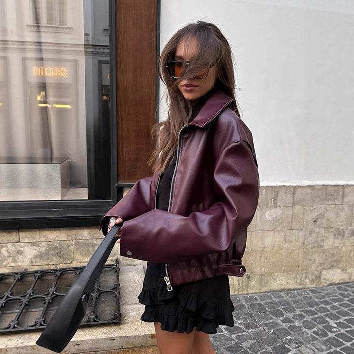 Damen Kurze Oversized Lederimitat-Flightjacke mit markantem Revers und Druckknopf-Manschetten Echoarchiv