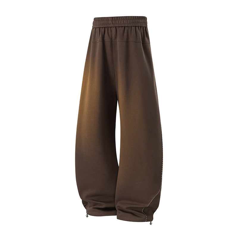 Herren Oversize-Baggy-Jogginghose mit Tunnelzug, seitlicher Druckknopfleiste & verstellbaren Beinabschlüssen Echoarchiv