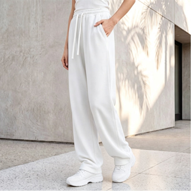 Damen nan weite Loungepalazzo-Hose mit hohem Komfortbund, Kordelzug, seitlichen Eingrifftaschen und dekorativer Seitennaht Echo Archiv