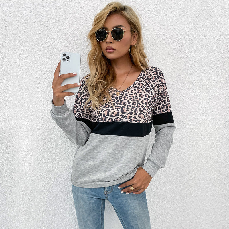 Damen Langarmshirt mit V-Ausschnitt und Leopardenmuster im Colorblock-Design Echoarchiv