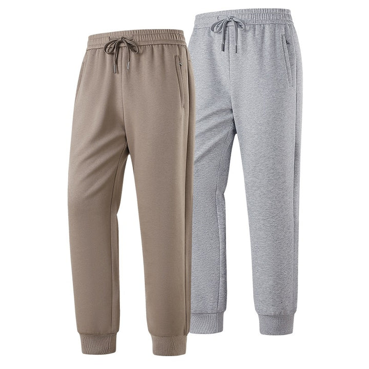 Herren Slim-Fit Freizeithose aus atmungsaktivem Funktionsfleece mit Kordelbund, Reißverschlusstaschen & Rippbündchen Echoarchiv