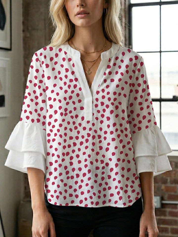 Damen Bluse mit voluminösen Flügelärmel und intensivem Blattmuster Echo Archiv