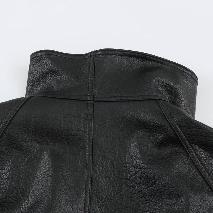 Damen Oversized Kunstleder-Capejacke mit hohem Stehkragen und Pattentaschen Echoarchiv