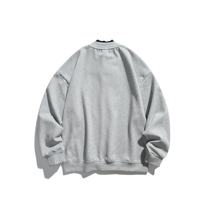 Unisex Oversize Knopfcardigan aus schwerer Baumwollfrottee mit tonalen Nahtpaspeln und geripptem Innenkragen Echoarchiv