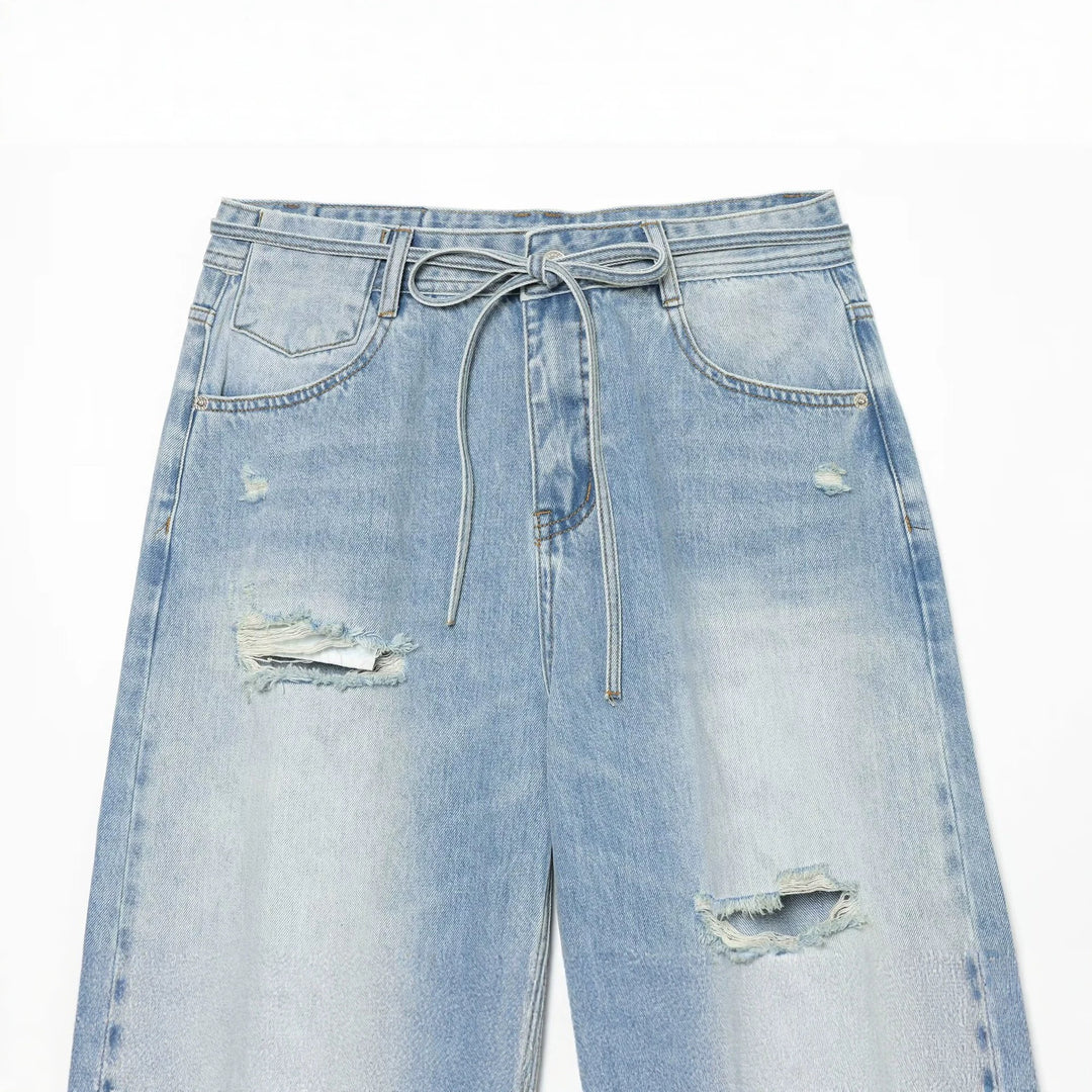 Damen Hochgeschnittene weite Denim-Jeans mit Destroyed-Details und Tunnelzug Echo Archiv