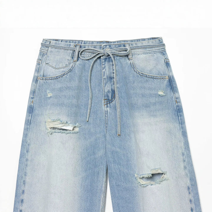 Damen Hochgeschnittene weite Denim-Jeans mit Destroyed-Details und Tunnelzug Echo Archiv