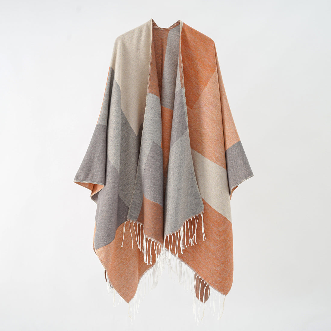 Damen Großer Wolloptik-Poncho mit geometrischem Blockmuster und Fransensaum – Célinea