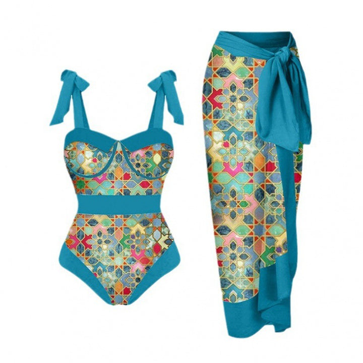 Damen Einteiler Badeanzug mit elegantem Wickelrock und modischen Riemen Echo Archiv