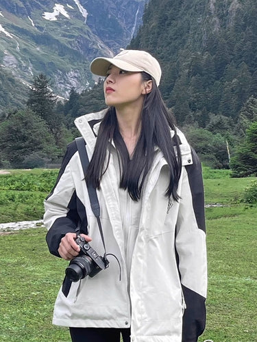 Damen zweilagige wasserdichte Outdoor‑Jacke mit Kapuze, atmungsaktiver Membran und verstellbarer Taille Echoarchiv