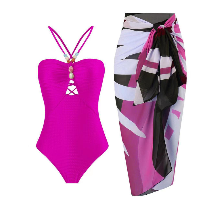 Damen Badeanzug mit elegantem Wickelrock und modischen Schmuckdetails Echo Archiv