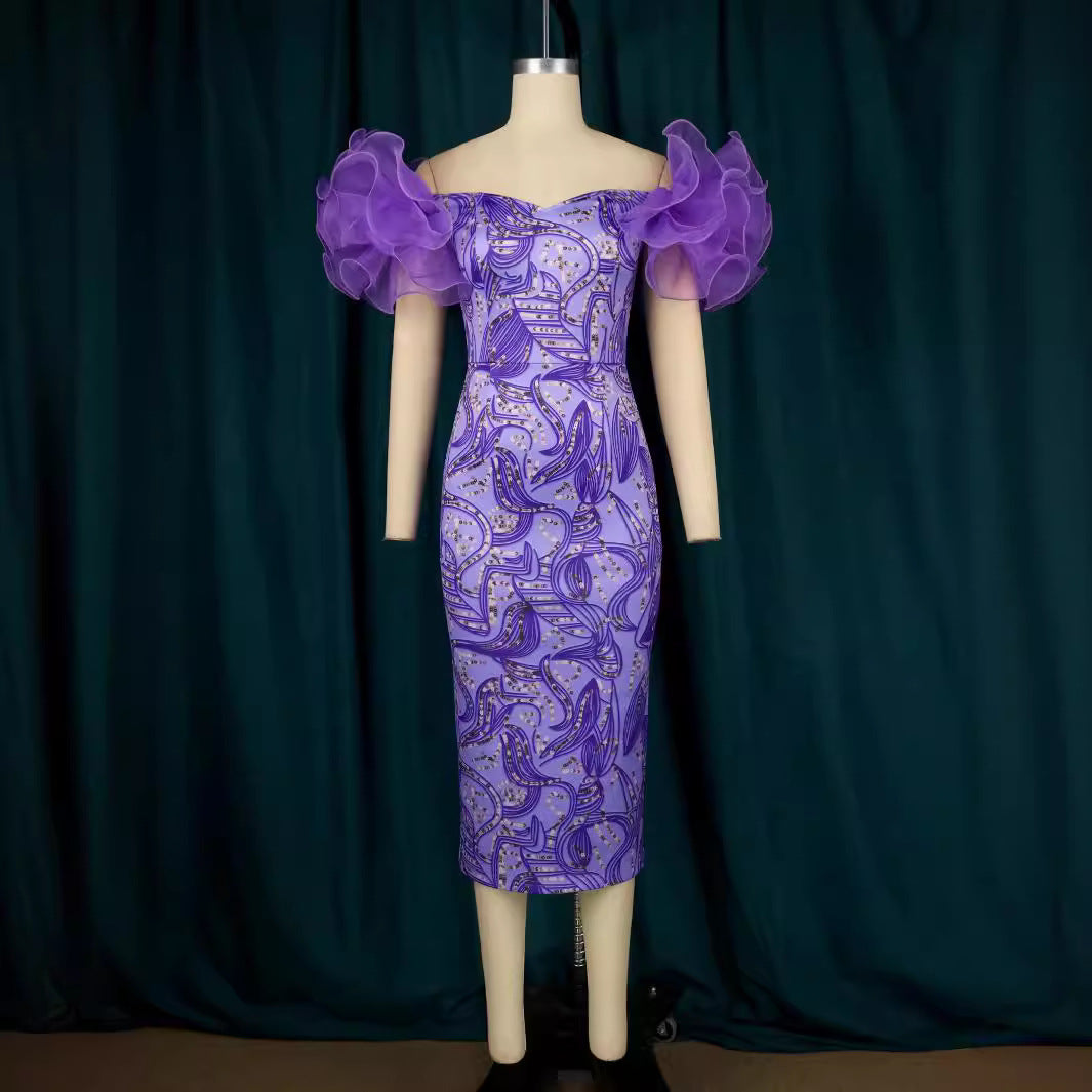 Damen Elegantes Midi-Kleid mit innovativen Puffärmeln und kunstvollem Druck Echo Archiv