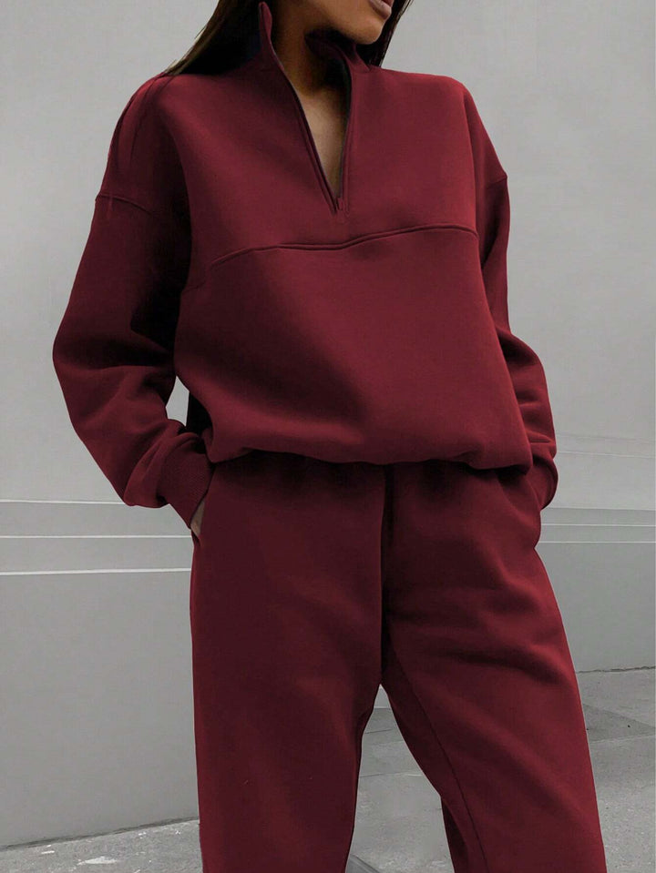 Damen Oversize Sweat-Set mit halbem Reißverschluss, Stehkragen und lässiger Jogginghose Echo Archiv