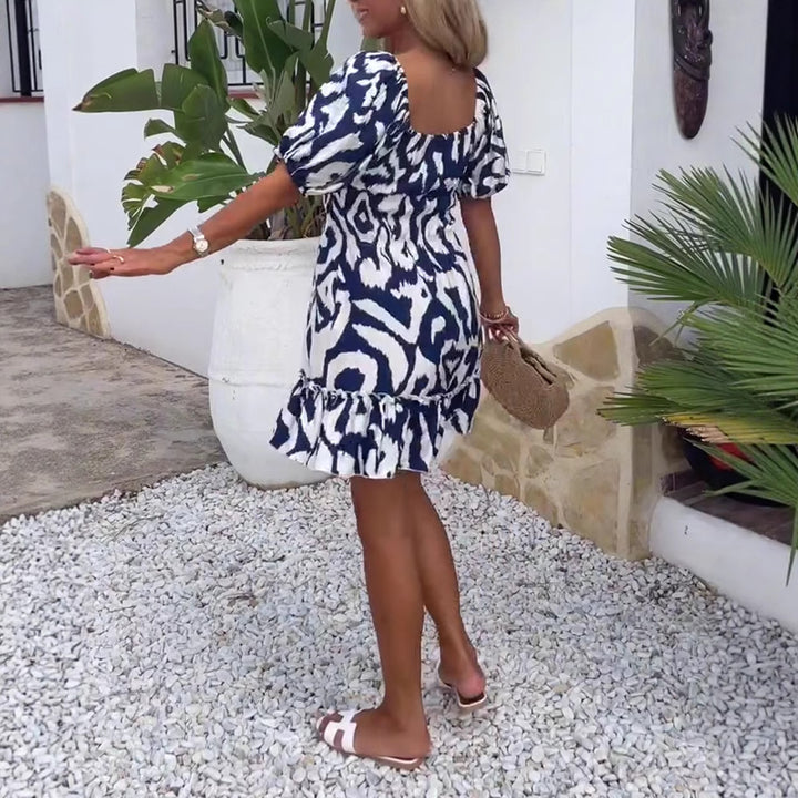 Damen nan Kurzschnitt-Sommerkleid mit quadratischem Ausschnitt, Puffärmeln und Volant-Saum Echo Archiv