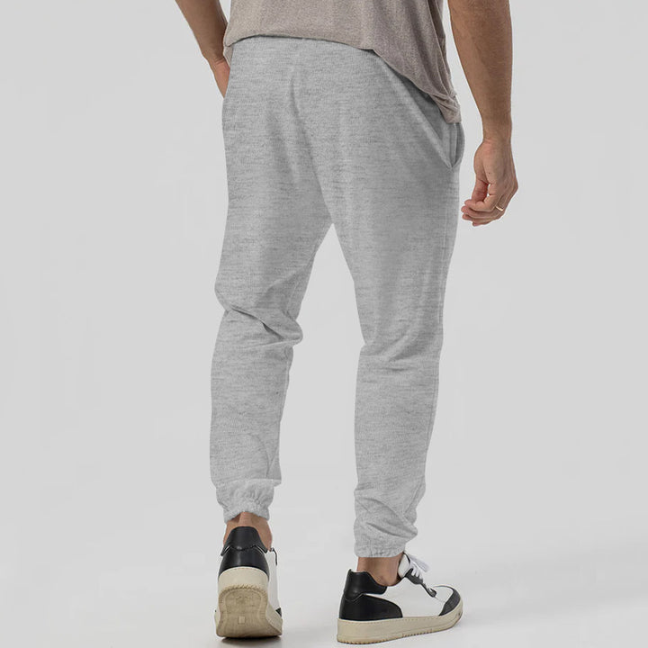 Herren Tapered-Jogginghose im Leinenlook mit Bügelfalte und Bündchen Echoarchiv