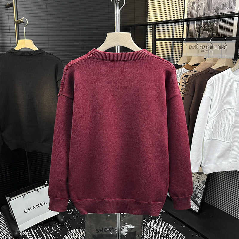 Herren Strukturierter Patchwork-Strickpullover mit Rundhals und gerippten Einsätzen Echoarchiv