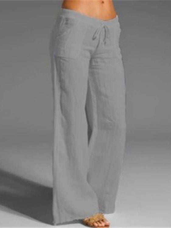 Damen weite Leinenhose mit hochgezogenem Bund und seitlichen Taschen Echoarchiv