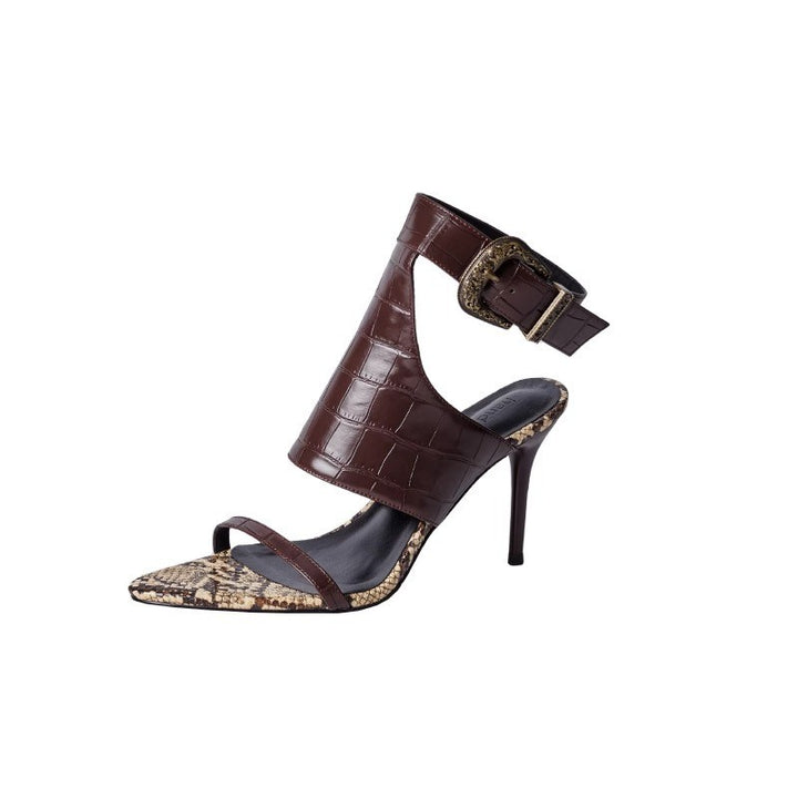 Damen Sandalette mit hohem Stiletto, breitem Kroko-Knöchelriemen und spitzer Schlangenoptik-Zehenkappe – Sorelia