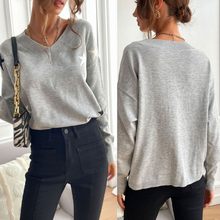 Damen Feiner V‑Ausschnitt Strickpullover mit Stern‑Intarsien und überschnittener Schulter Echoarchiv
