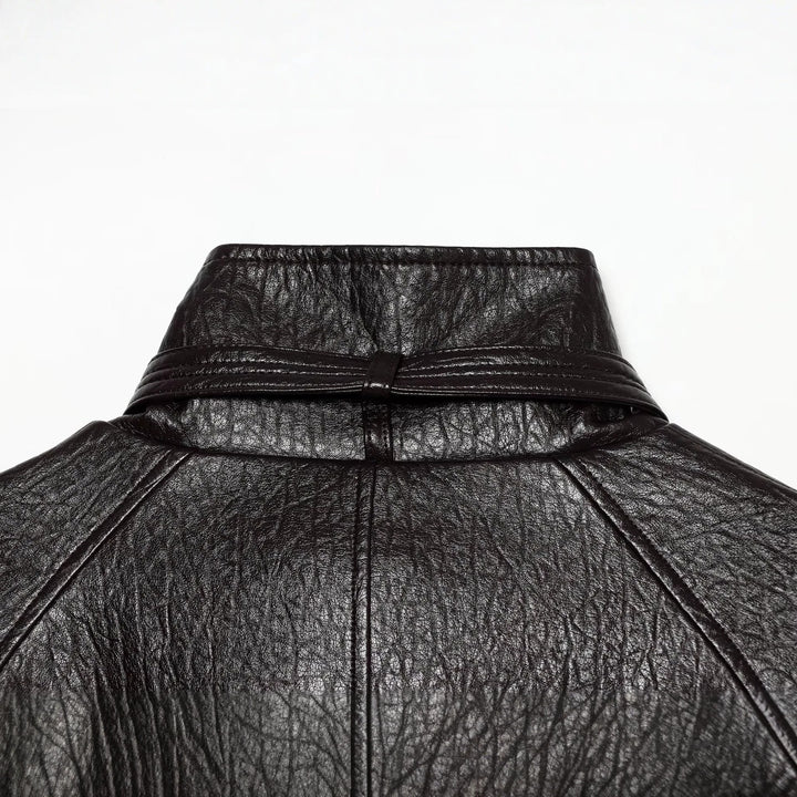 Damen Kurzjacke aus Lederimitat mit hohem Schnallenkragen und Taillengürtel Echoarchiv