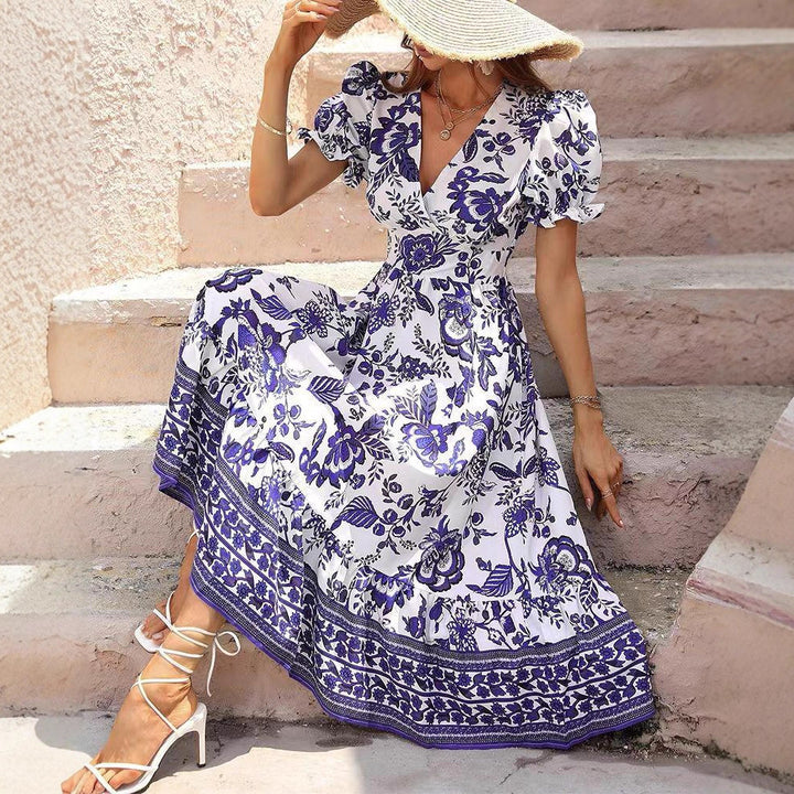 Damen nan boho-inspiriertes Maxikleid mit geraffter Empire-Taille, kurzen Puffärmeln und dekorativem Bordürenprint Echo Archiv