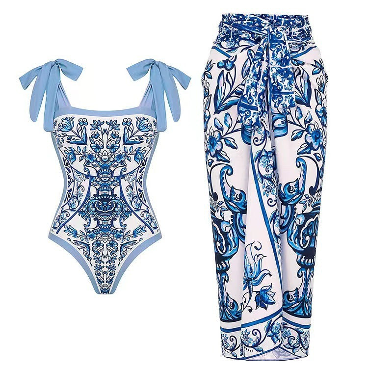 Damen Badeanzug mit floralem Druck und passendem Wickelrock Echo Archiv