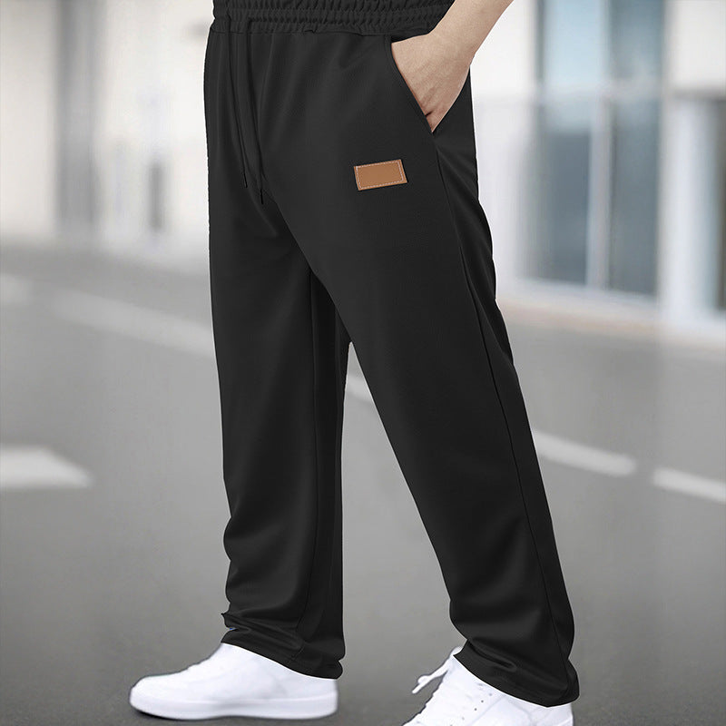 Herren Sportliche Jogginghose mit elastischem Bund und praktischen Taschen Echoarchiv