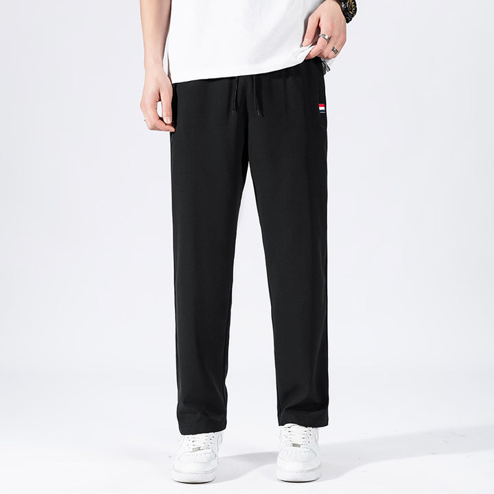 Herren Sportliche Jogginghose mit elastischem Bund und Seitentaschen Echo Archiv
