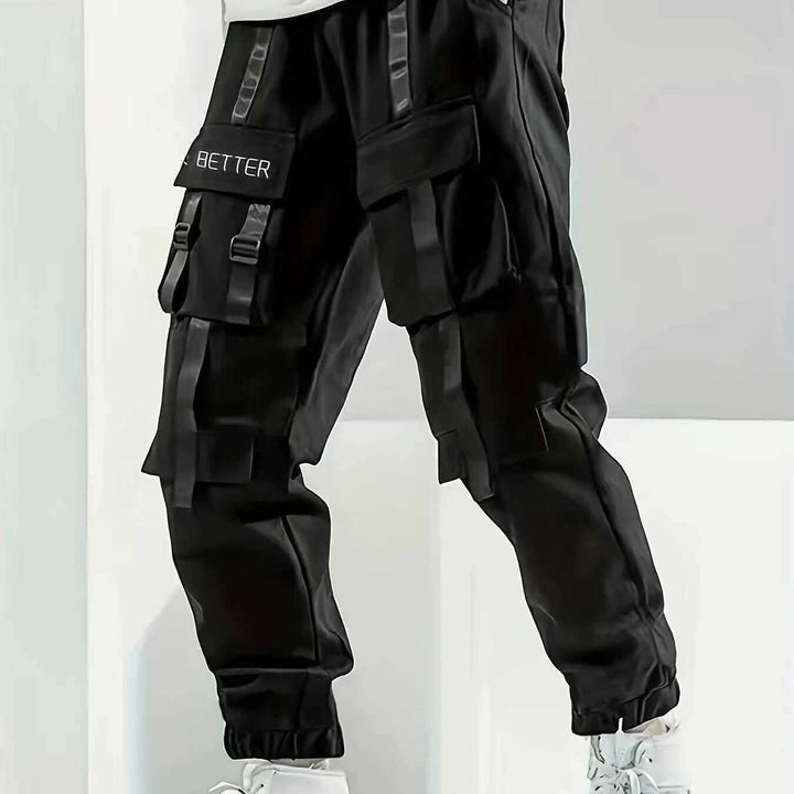 Herren Multifunktionale Cargo-Jogginghose mit Klapp‑ und Gurt-Details Echo Archiv