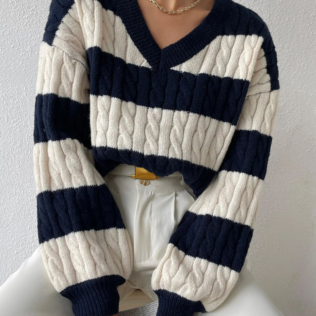 Damen nan gestreifter Grobstrick-Pullover mit Zopfmuster, tiefem V-Ausschnitt und oversized Passform Echo Archiv