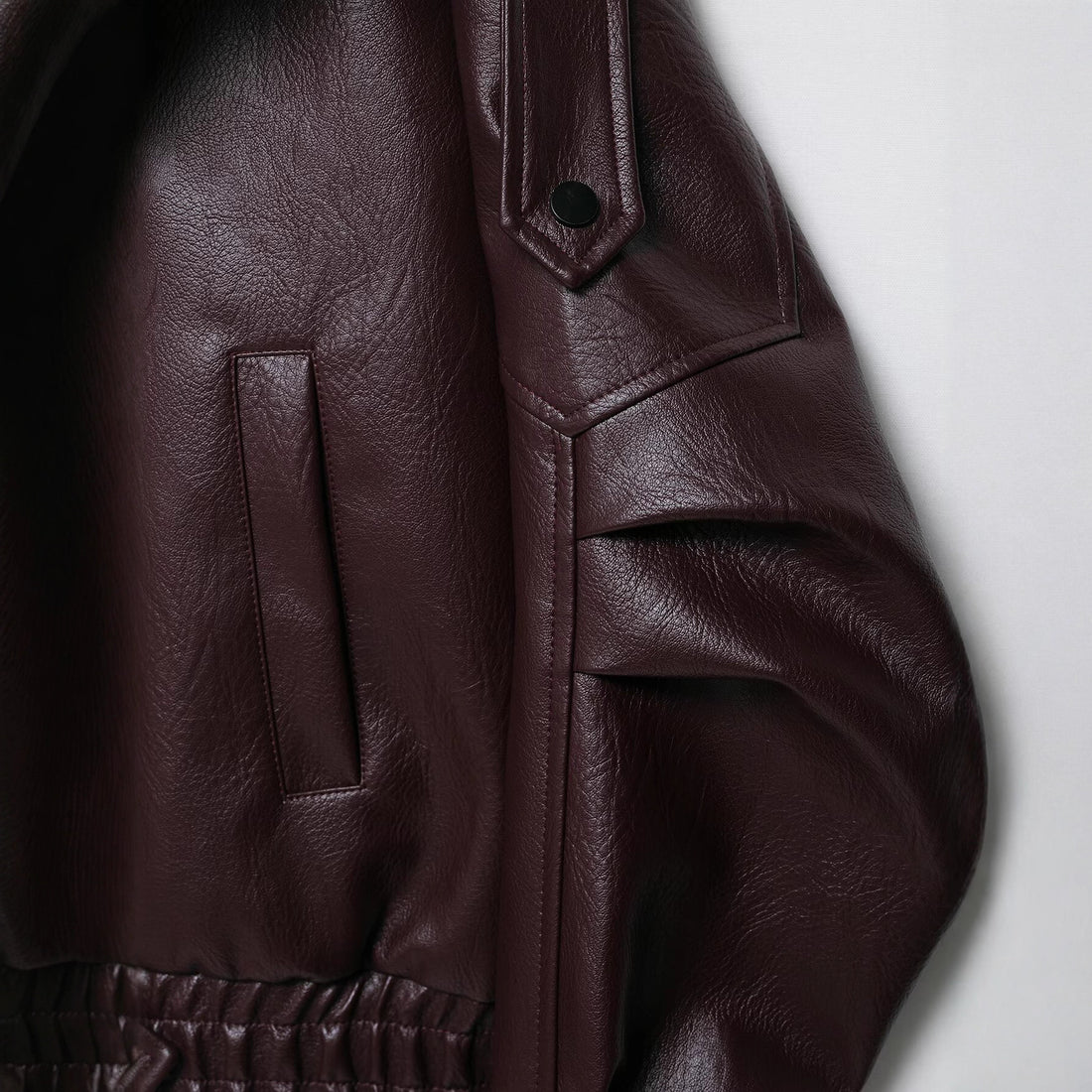 Damen Oversized Lederjacke im Bomberstil mit Taillengürtel Echoarchiv