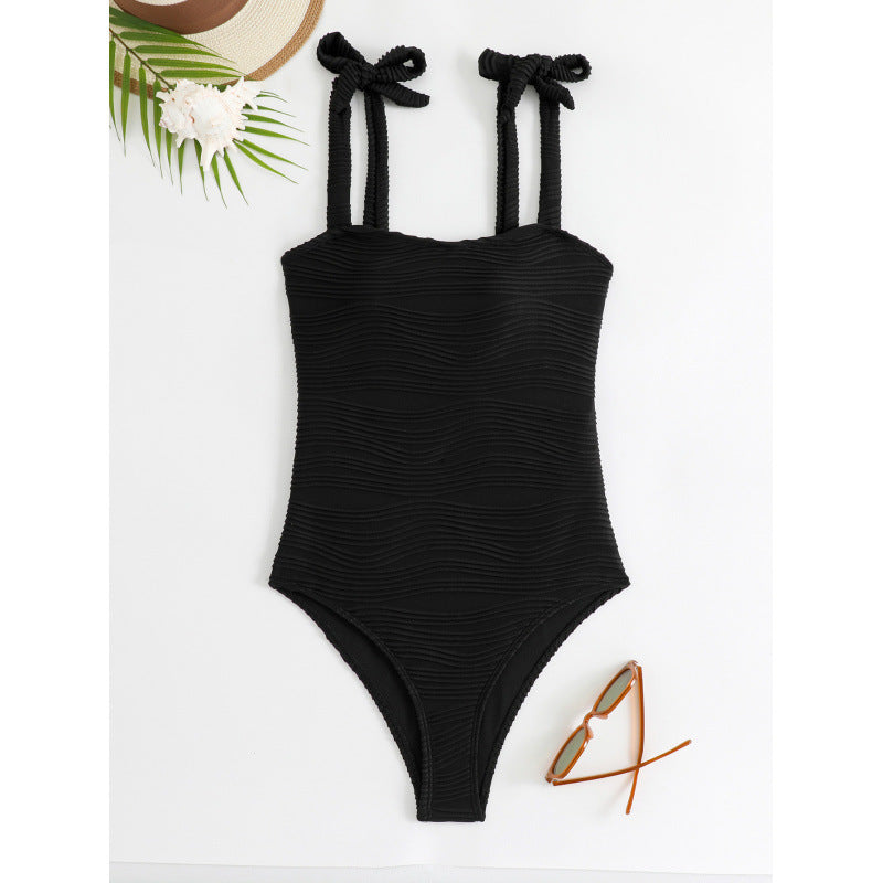 Damen Einteiler Badeanzug mit modischem Wickelrock und eleganten Bindebändern Echo Archiv