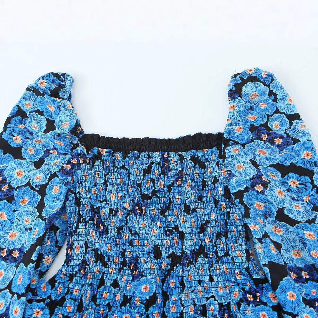 Damen Midikleid mit Smok-Büste, Volantstufen und langen Ballonärmeln Echo Archiv