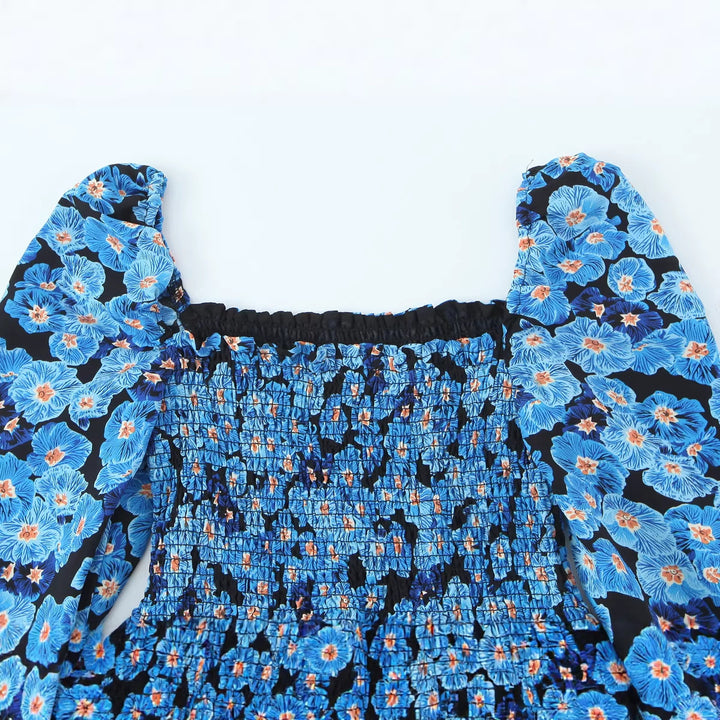 Damen Midikleid mit Smok-Büste, Volantstufen und langen Ballonärmeln Echo Archiv