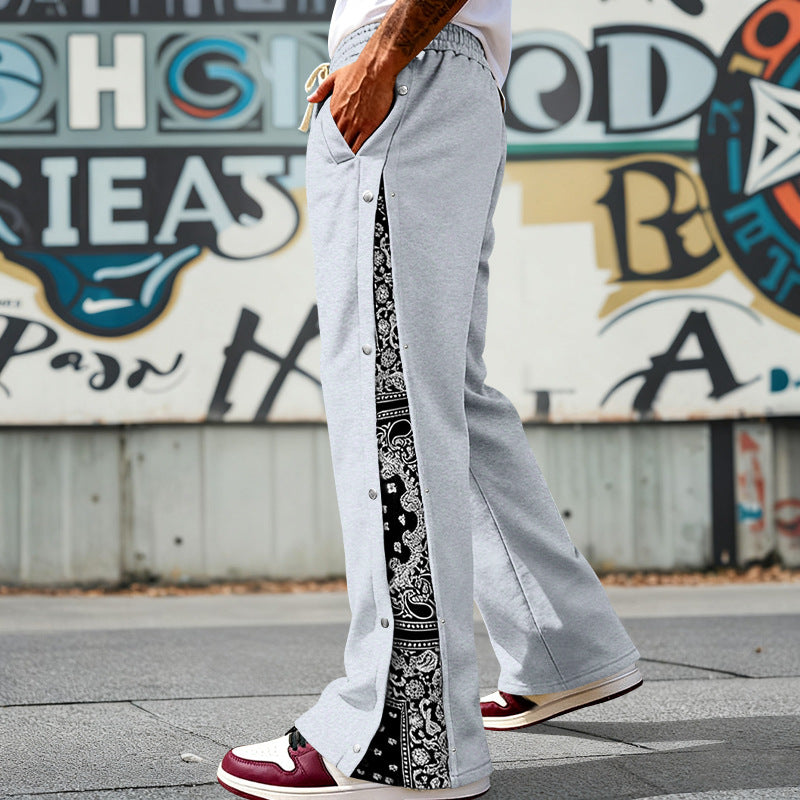 Herren nan weit geschnittene Snap-Front Jogginghose mit Paisley-Seiteneinsatz und elastischem Komfortbund Echo Archiv