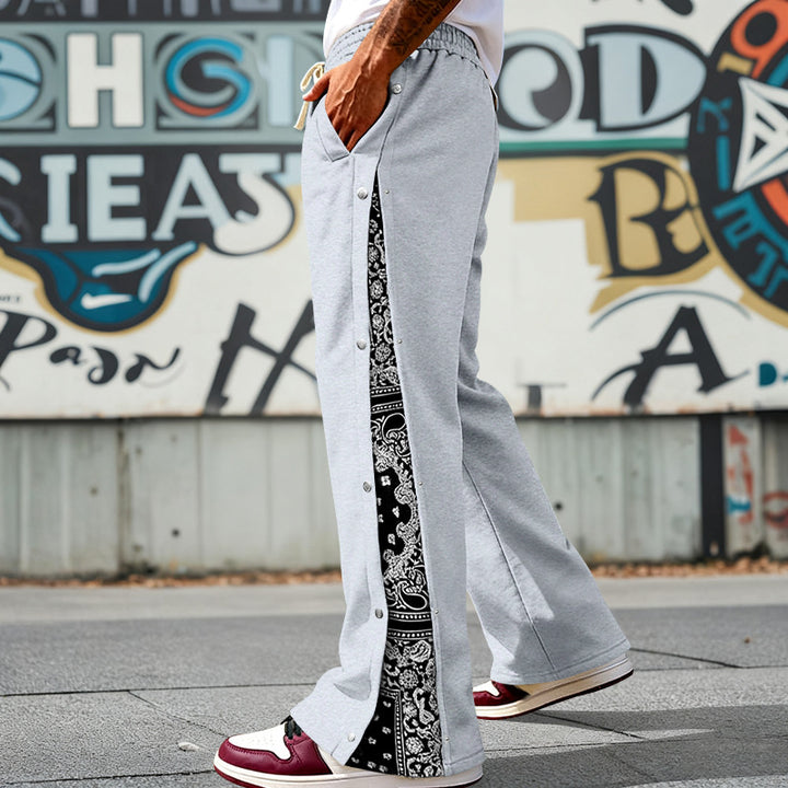Herren nan weit geschnittene Snap-Front Jogginghose mit Paisley-Seiteneinsatz und elastischem Komfortbund Echo Archiv
